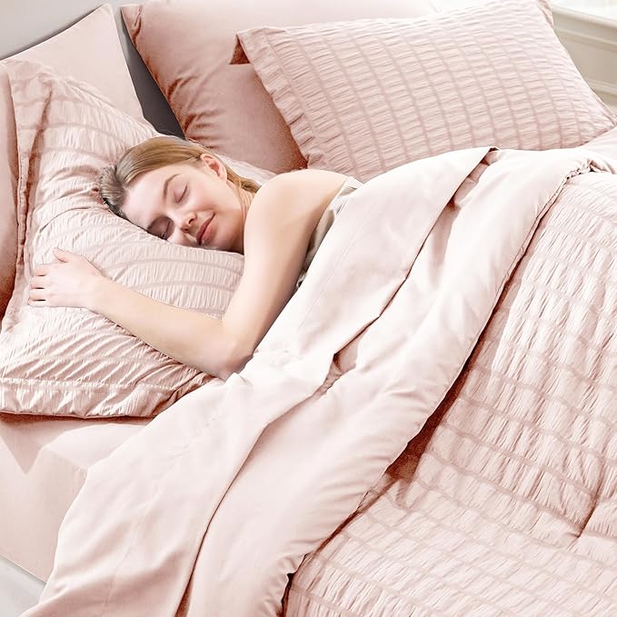 CozyLux Oversized King Comforter Set Blush Pink Seersucker 7 Pieces 120x98 Bed in a Bag Comforter Set with Sheets, Luxury Soft Bedding Sets with Down Alternative Comforter, Sheets, Pillowcases & Shams