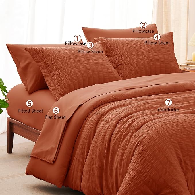 CozyLux Oversized King Comforter Set Burnt Orange Seersucker 7 Pieces 120x98 Bed in a Bag Comforter Set with Sheets, Terracotta Bedding Set with Down Alternative Comforter, Sheets, Pillowcases & Shams